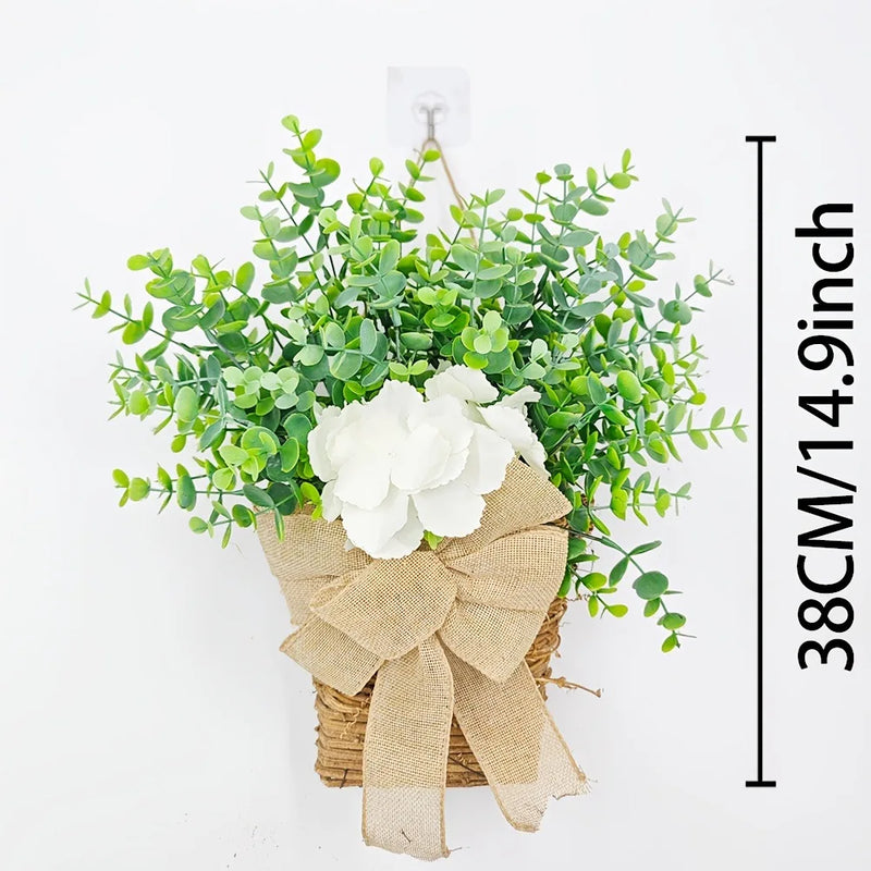 couronne de printemps en eucalyptus et fleurs blanches décorative