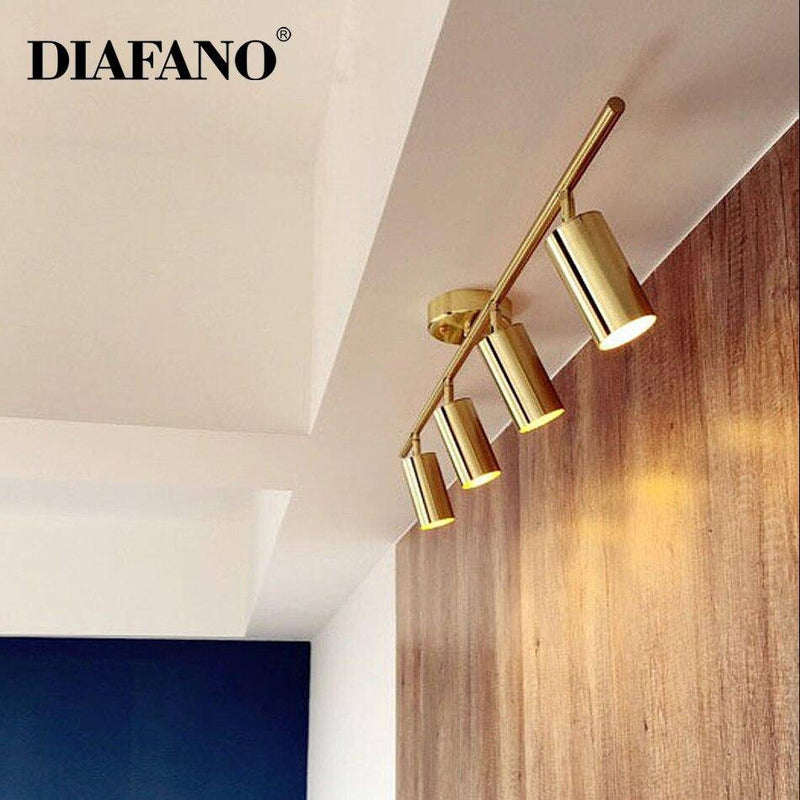 Spot moderne arrondi LED en métal doré