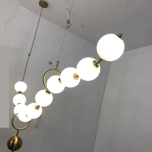 lustre à led en chaîne de boules en verre élégant et moderne