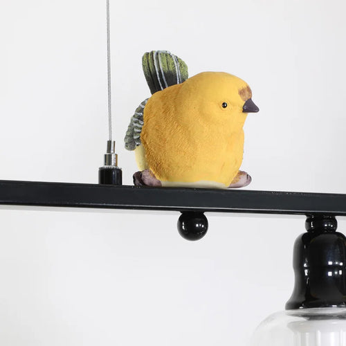 Nordischer Kronleuchter aus Eisen, Glas und Harz mit dekorativem Vogel - vue 7 sur 7