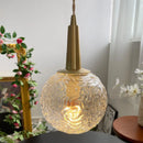 Pendelleuchte aus goldenem Glas mit elegantem Kupferdesign