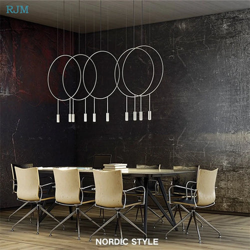 Kreative runde Pendelleuchte im nordischen Design aus Metall postmodern - vue 3 sur 12