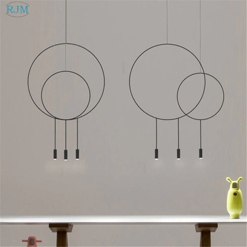 Kreative runde Pendelleuchte im nordischen Design aus Metall postmodern - vue 6 sur 12