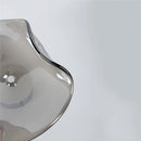 Moderne LED-Wandleuchte aus Glas mit gebogener Oberfläche