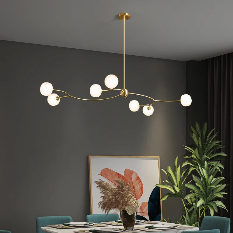lustre de restaurant en cuivre design ambiance moderne pour intérieur