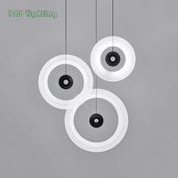 Runde minimalistische Pendelleuchte aus Aluminium und Glas für moderne Räume
