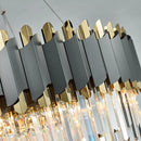 Eleganter und moderner Art-Déco-Kronleuchter aus Edelstahl und Kristall