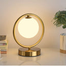 Goldene LED-Tischlampe mit Glaskugel