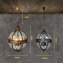 Vintage-Pendelleuchte Globe aus Schmiedeeisen mit Glasschirm