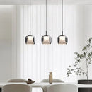 Moderne LED-Pendelleuchte aus rauchgrauem Glas mit drei Köpfen