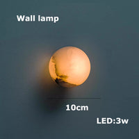 lustre en marbre de la collection pingpong world éclairage suspendu élégant