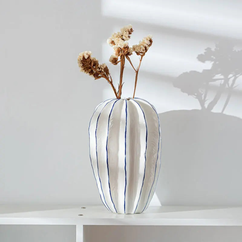 vase en céramique carambola pour décoration artisanale avec fleurs séchées - vue 4 sur 7