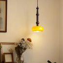 Moderne und kreative Pendelleuchte aus Holz und Glas