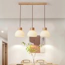 Moderne Pendelleuchte mit Glasschirm für Kücheninsel