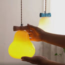 Pendelleuchte aus Glas mit rosa Schleife für das Kinderzimmer