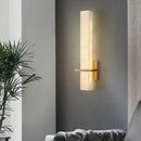 Wandleuchte aus Naturmarmor und Kupfer im kubischen Design für stimmungsvolle Beleuchtung