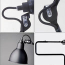 lampadaire rotatif à bras long en métal sur pied
