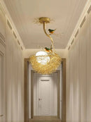 lustre led moderne en forme de nid d'oiseau avec boule de verre