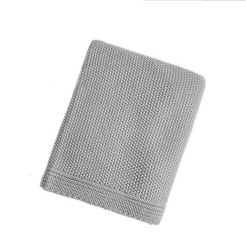 Plaid tricot motif carreaux style nordique pour salon