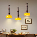 Moderne und kreative Pendelleuchte aus Holz und Glas