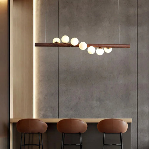 Kronleuchter aus Nussbaumholz und Glas im modernen Design für ein elegantes Interieur - vue 7 sur 13