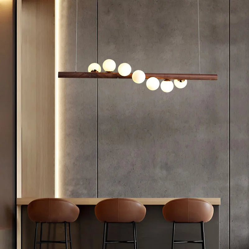 Kronleuchter aus Nussbaumholz und Glas im modernen Design für ein elegantes Interieur - vue 6 sur 13
