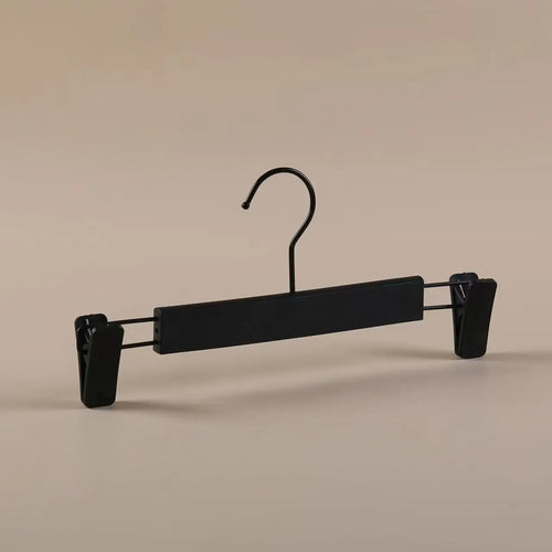 porte-vêtements en fer forgé pour une décoration élégante et moderne