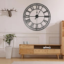 horloge murale moderne en fer noir chiffres romains décoration intérieure