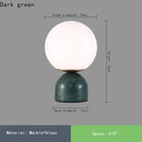 lampe à poser en marbre et verre pour intérieur élégant