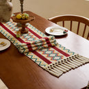 Chemin de table bohème motif aztèque tissé pompons