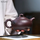 Theiere yixing zisha argile violette sculptee 360 ml