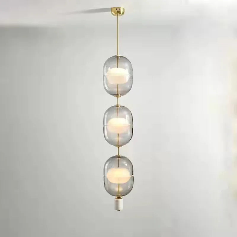 Nordische Pendelleuchte aus Glas mit Deckenleuchte aus Marmor und Metall - vue 4 sur 8