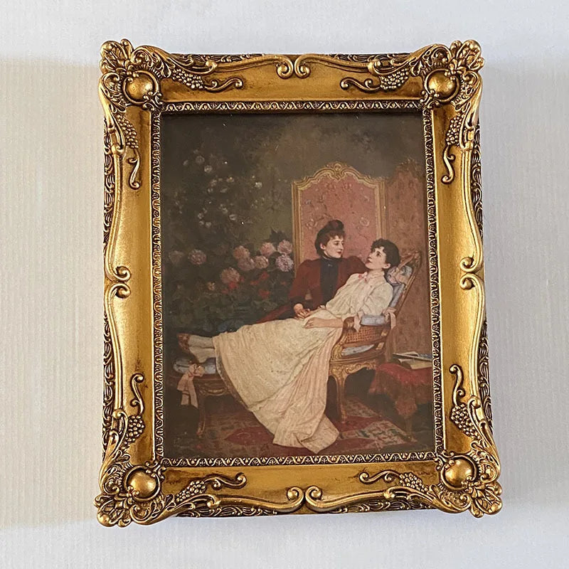 Rectangular retro gold resin photo frame. Wall relief with frame painting, combination of creative picture frame. Canvas album.