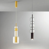 Moderne Pendelleuchte aus klarem Glas mit goldfarbenem und schwarzem Metall