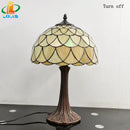 Nordische Tischlampe aus antikem Glas im Tiffany-Stil