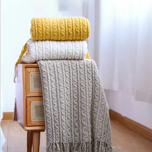 Plaid nordique carreaux style boheme doux pompons