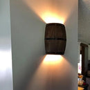 Retro-Wandleuchten in Fass-Optik aus Holz