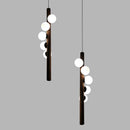 Kronleuchter aus Nussbaumholz und Glas im modernen Design für ein elegantes Interieur