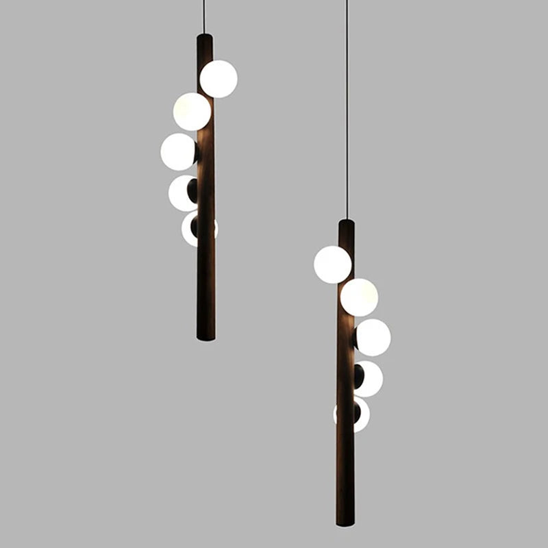 Kronleuchter aus Nussbaumholz und Glas im modernen Design für ein elegantes Interieur - vue 4 sur 13