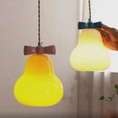 Pendelleuchte aus Glas mit rosa Schleife für das Kinderzimmer