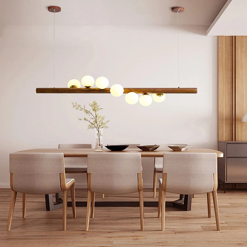 Kronleuchter aus Nussbaumholz und Glas im modernen Design für ein elegantes Interieur - vue 5 sur 13