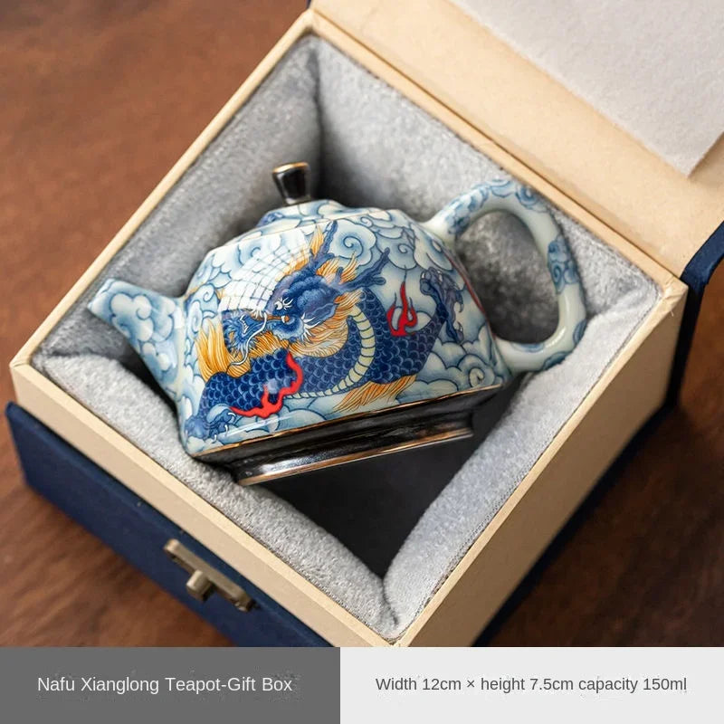 Théière chinoise en porcelaine décor traditionnel infuseur