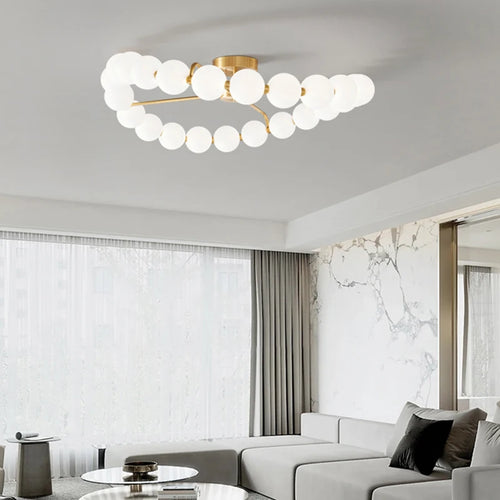 lustre à led avec anneau en cuivre et boule acrylique