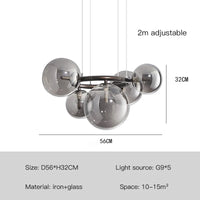 Design-Kronleuchter mit Glaskugel und runder Metallstrebe