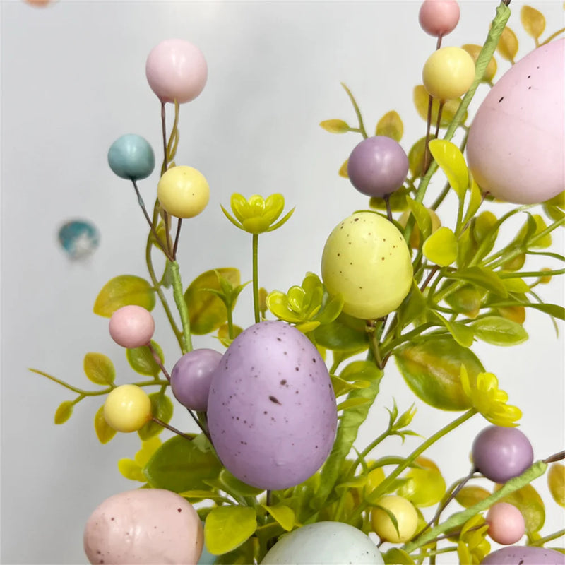 décoration de pâques œufs artificiels et bouquets de fleurs colorées