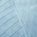 plaid tricoté jacquard à pompons motif carreaux