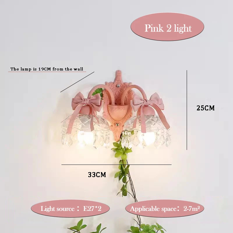 Wandleuchte Prinzessin aus Kristallglas mit rosa Schleife