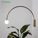 Gebogene LED-Wandleuchte aus goldfarbenem Metall G9