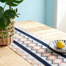 Chemin de table bohème motifs aztèques beige pompons