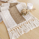 Chemin de table bohème beige motifs géométriques pompons